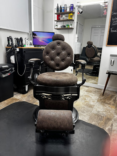 Premium barber chair at Fade District Barbershop Kingston